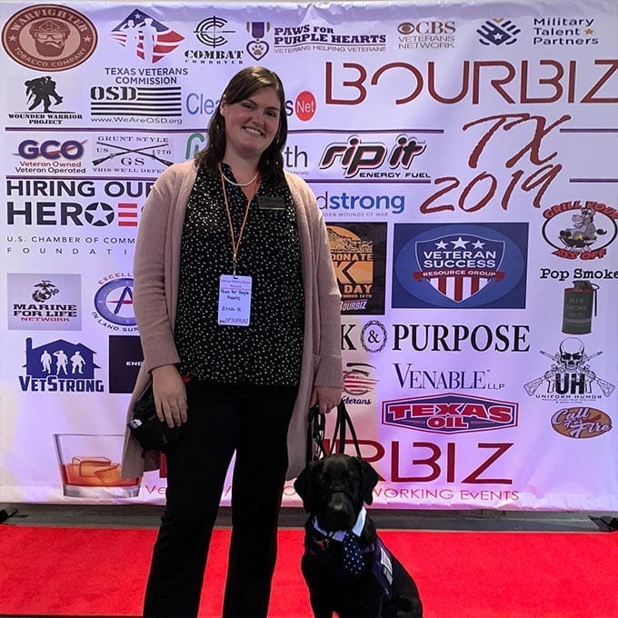 Program Instructor Erica poses with service dog in training Sergeant before BourBiz officially starts.