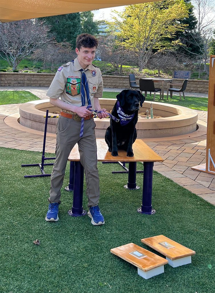 Jared with Ambassador Dog, Schatzie, after dropping of the project