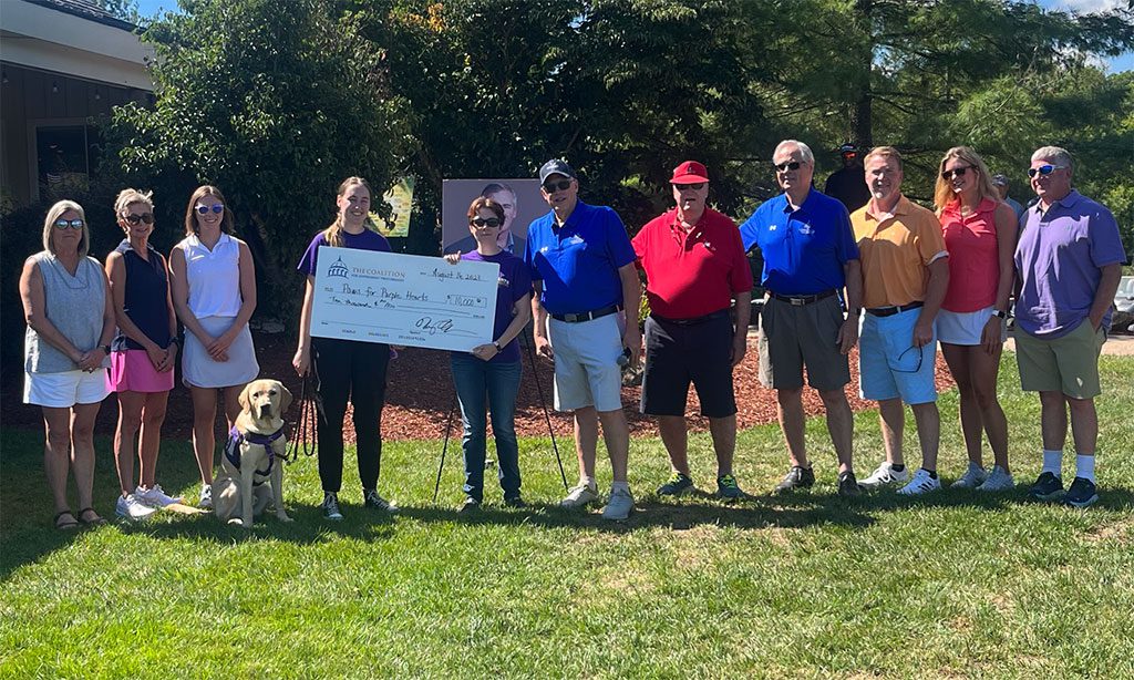 The Coalition For Government Procurement Presents Paws For Purple Hearts With a Generous Donation! Photo by: CGP Staff